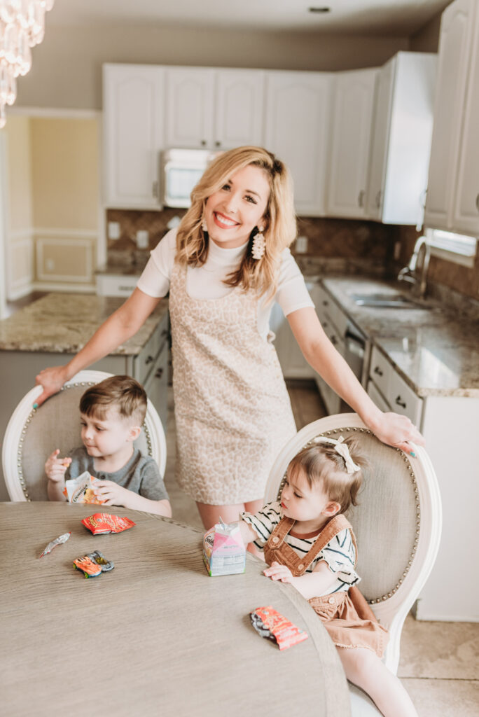 Brianna K with her children Landon and Presley at the breakfast table in her kitchen sharing 5 mommy motivation tips
