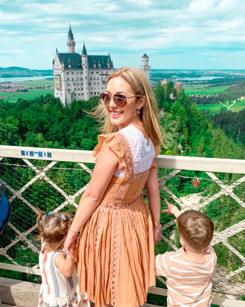 Brianna K, Landon, and Presley in front of Neuschwanstein Castle in Bavaria MUNICH, GERMANY TRAVEL DIARY | 4-DAY ITINERARY AND TRAVEL TIPS Brianna K bitsofbri young family traveling the world 