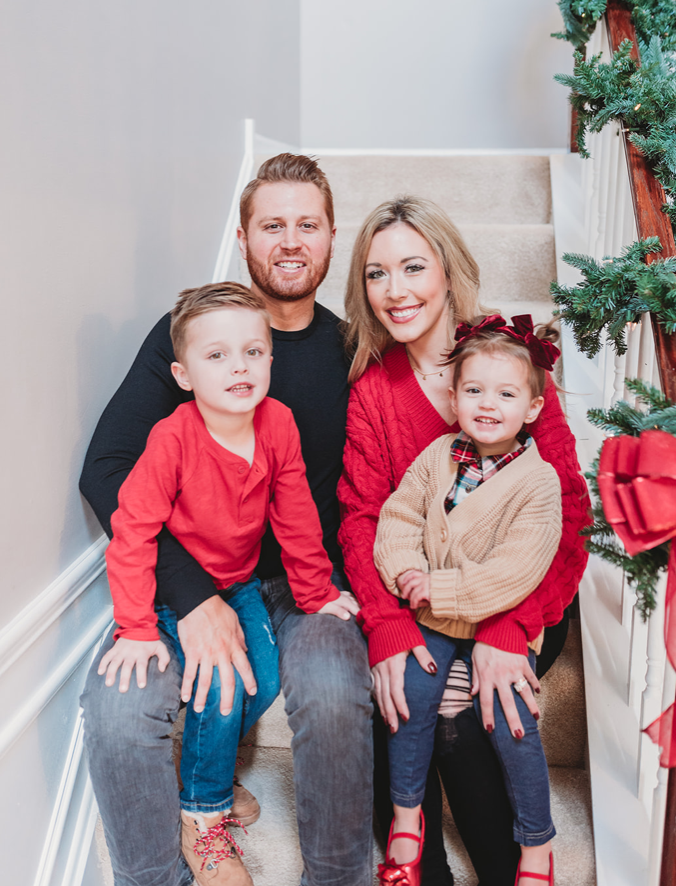 Family dressed for christmas photos sitting on stairs of home Brianna K Adam Landon Presley bitsofbri family christmas pictures 2019 