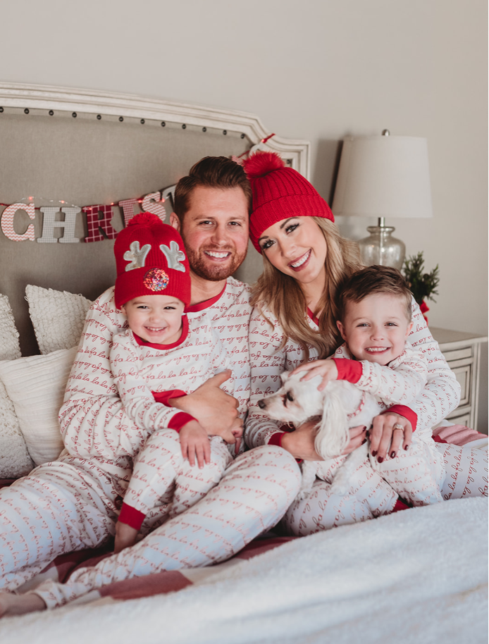 family snuggling in matching christmas pajamas by LC Lauren Conrad Brianna K bitsofbri Adam Landon Presley colie 