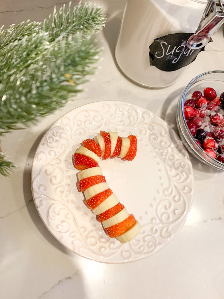 Fruit Candy Cane for toddlers to eat fruits Christmas party food ideas | Brianna K Bits of Bri Blog 